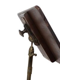 An English Mahogany and Brass Table with Adjustable Book Shelf — 19TH/20TH CENTURY