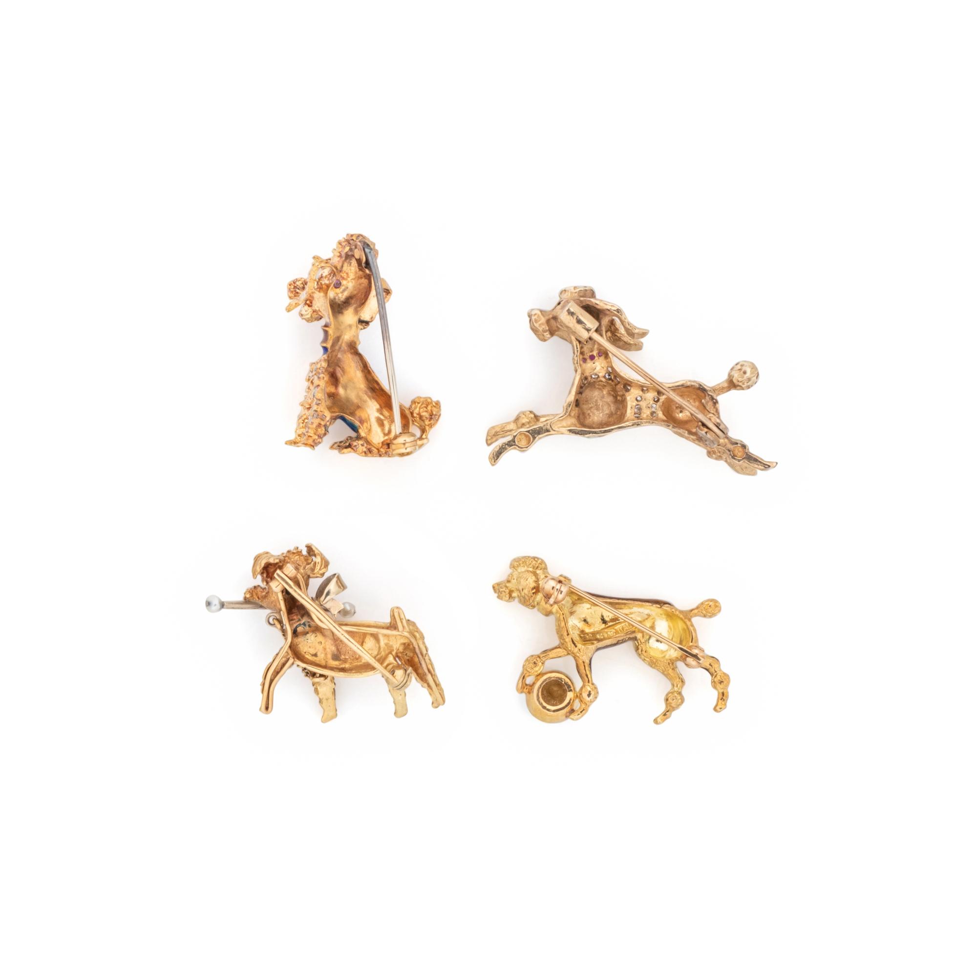 COLLECTION OF YELLOW GOLD POODLE BROOCHES