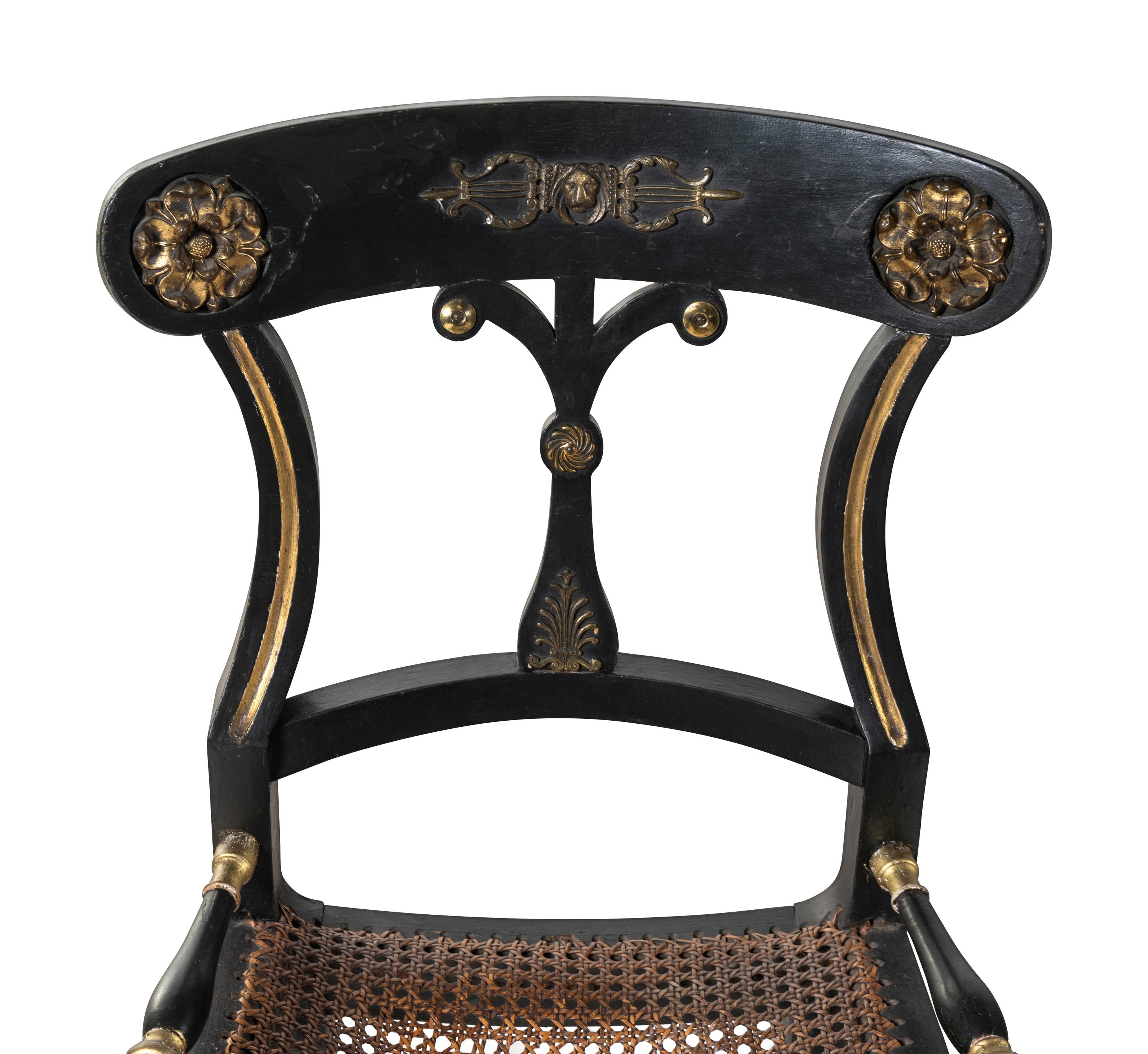 A Pair of Regency Dark Green-Painted and Parcel Gilt Side Chairs