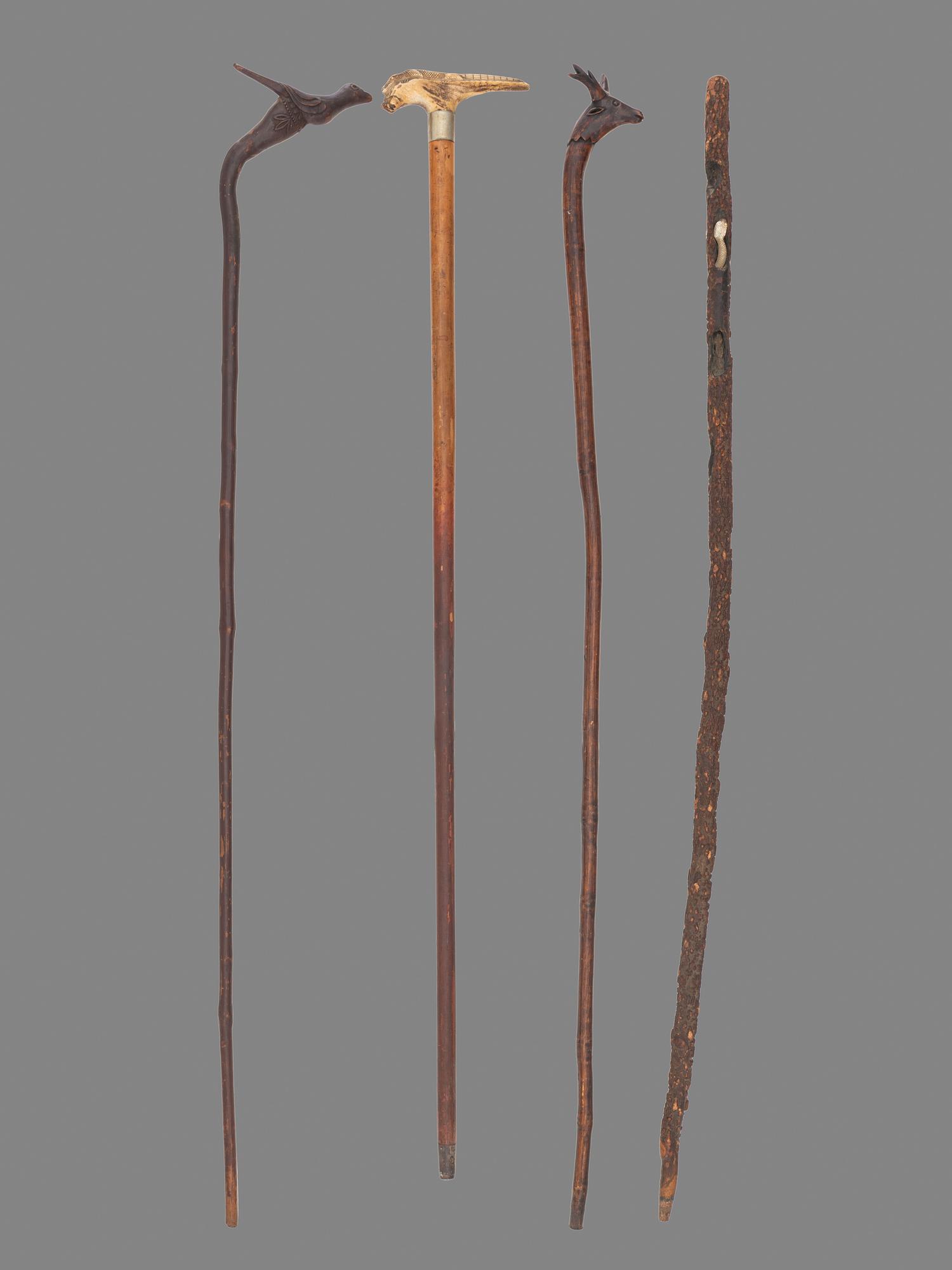 Four Folk Art Carved Canes