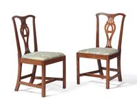 A Pair Of Chippendale Carved Mahogany Side Chairs