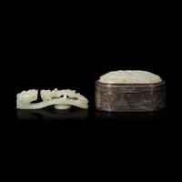 A Chinese Carved Jade Plaque-Inset Silver Box and a Jade 'Dragon' Belt Hook, 18th/19th Century 清中期 銀嵌玉牌香盒及蒼龍教子帶鈎