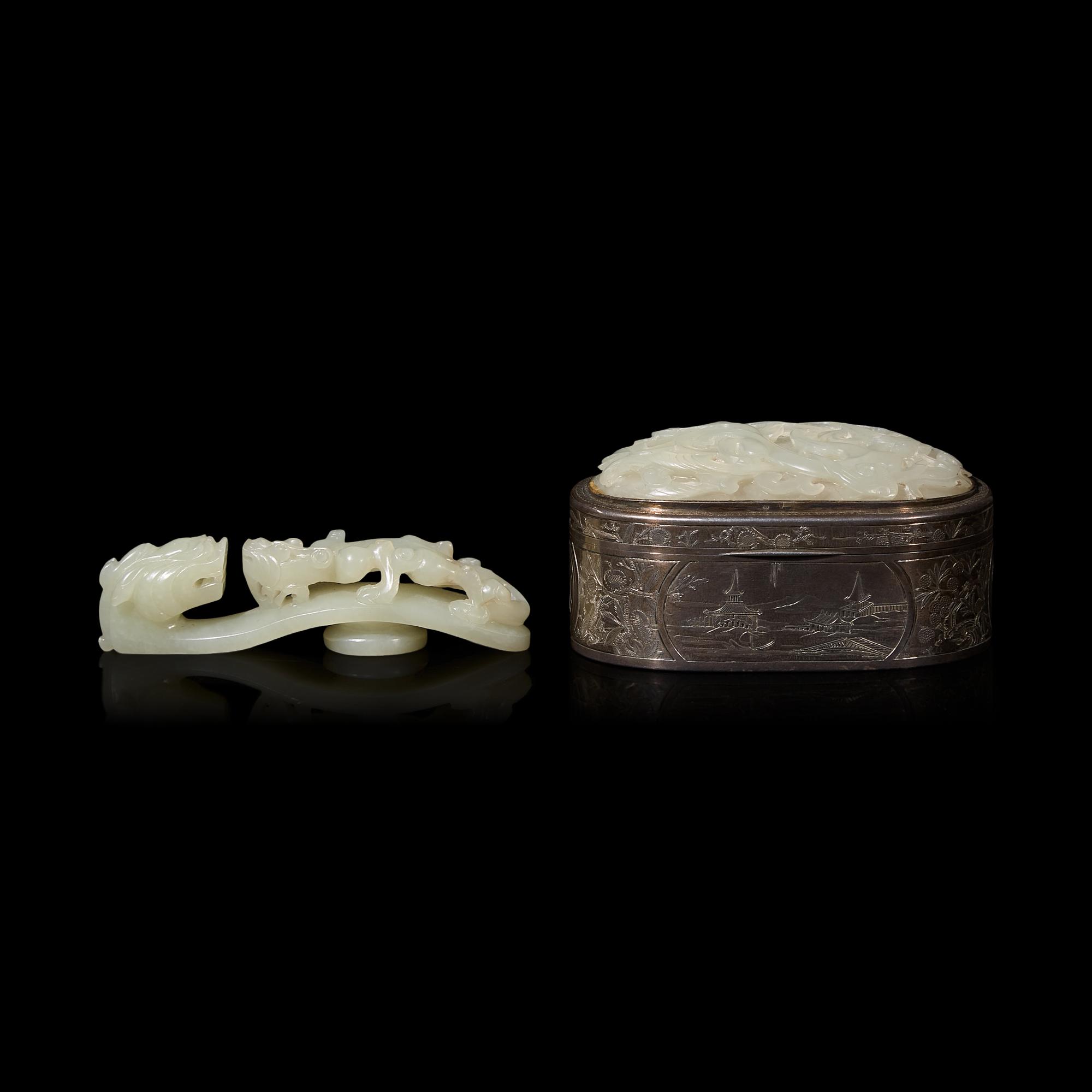 A Chinese Carved Jade Plaque-Inset Silver Box and a Jade 'Dragon' Belt Hook, 18th/19th Century 清中期 銀嵌玉牌香盒及蒼龍教子帶鈎