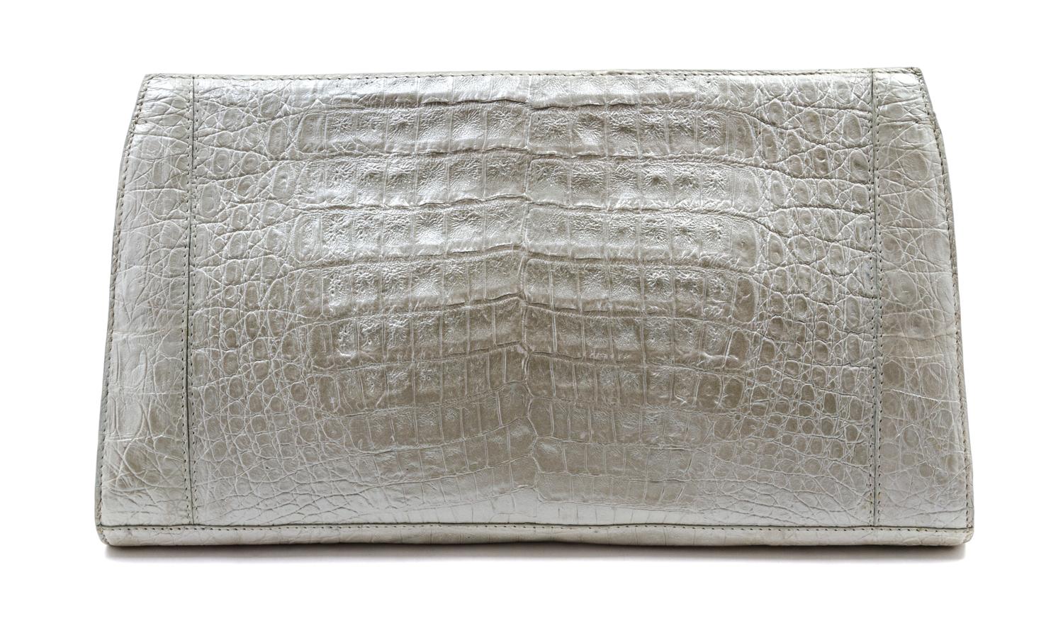 A Nancy Gonzalez Iridescent Ivory Crocodile Clutch, 12 x 6 1/2 x 1 1/2 inches.