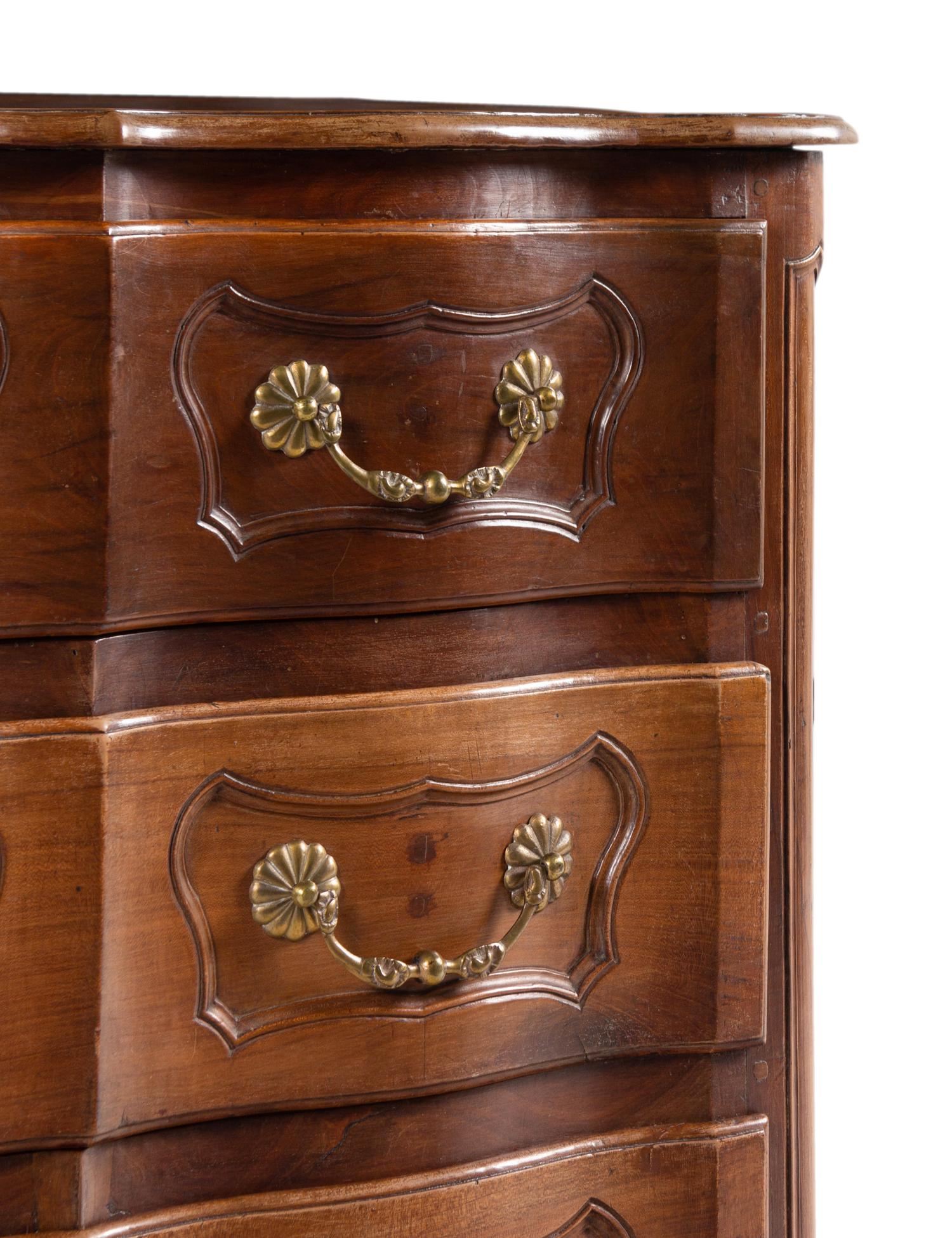 A French Provincial Walnut Serpentine-Front Chest of Drawers