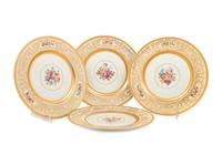 A Set of Eight Bavarian Parcel Gilt Porcelain Dinner Plates