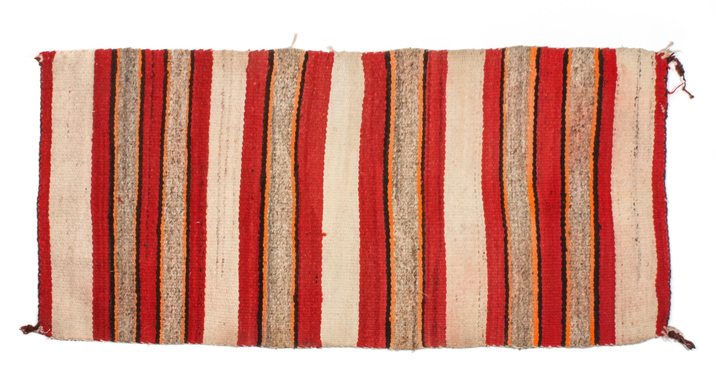 Three Navajo Rugs Largest: 56 x 26 1/2 inches