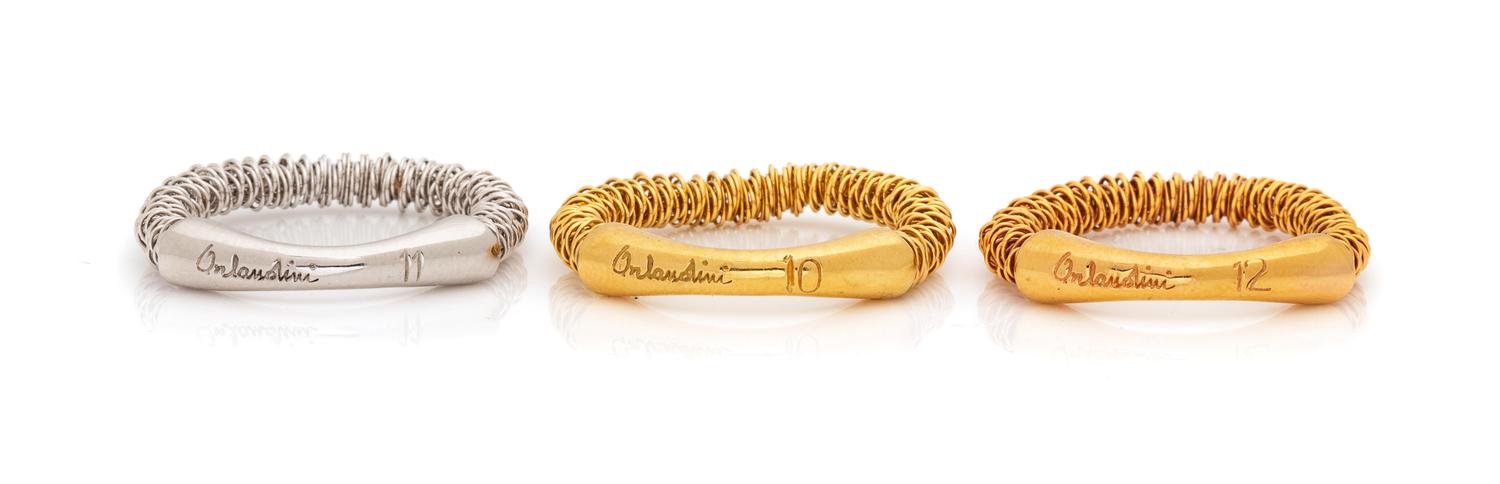 A Collection of 18 Karat Tricolor Gold Rings, Orlandini,