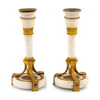 A Pair of Directoire Gilt Bronze and White Marble Candlesticks