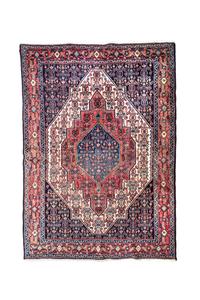 A Heriz Wool Mat 5 feet 3 inches x 3 feet 11 inches.