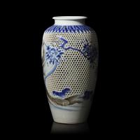 A Japanese Hirado Blue and White Porcelain Reticulated Double-Walled 'Koi and Flowers' Vase, Meiji/Taisho Period 日本明治/大正時期 平戶燒青花鯉魚圖賞瓶
