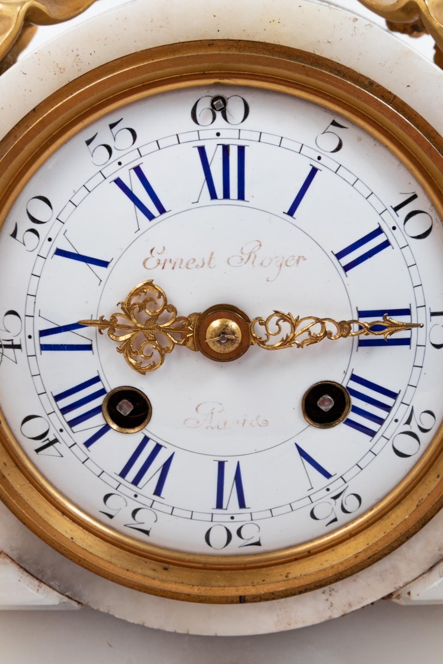 A Louis XVI Style Gilt Bronze Mounted Onyx Mantel Clock