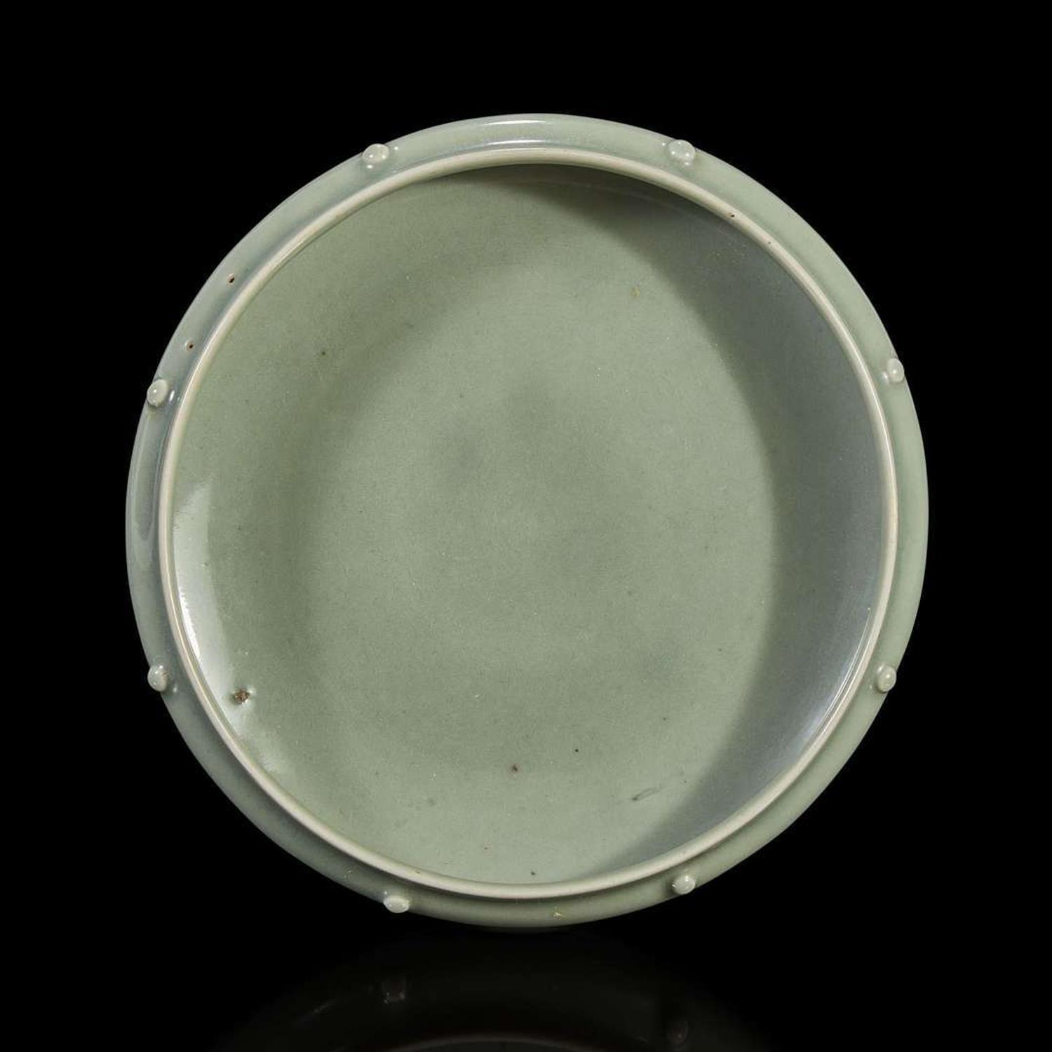 A Chinese celadon-glazed tripod brush washer