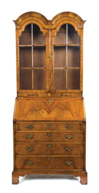 A Queen Anne Style Walnut Double Domed Secretary Bookcase, Height 80 x width 34 1/2 x depth 19 3/4 inches.