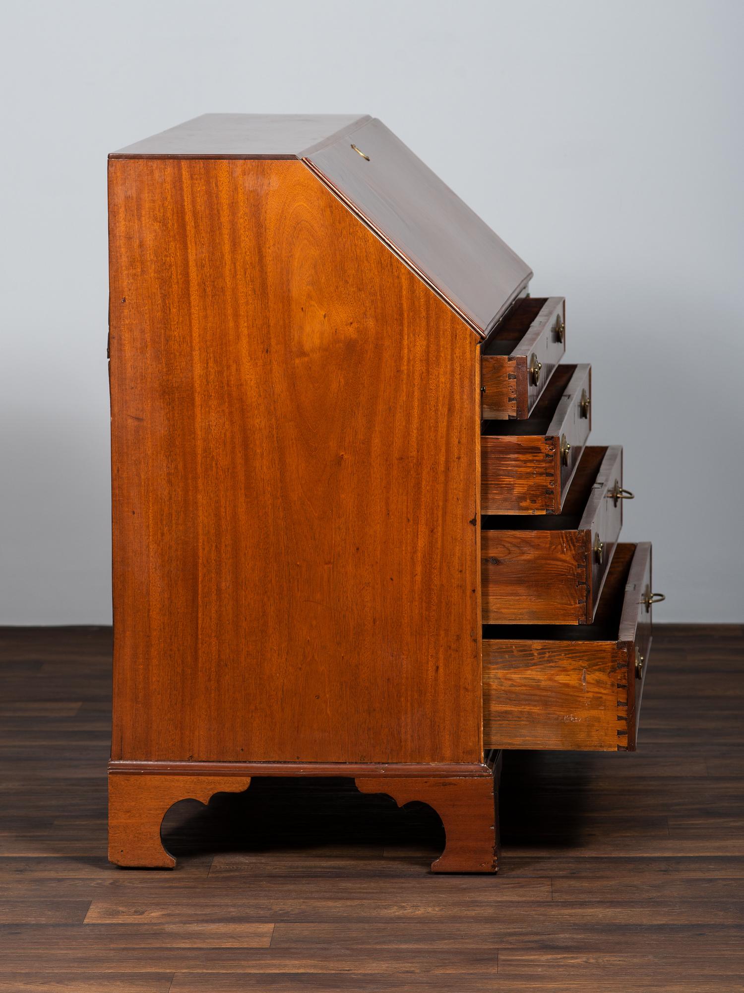 A Chippendale Figured Mahogany Slant-Front Desk