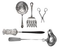 A Group of Four Silver Serving Articles, Various Makers, comprising an asparagus server, Gorham Mfg. Co.; a tomato server, Tiffany & Co