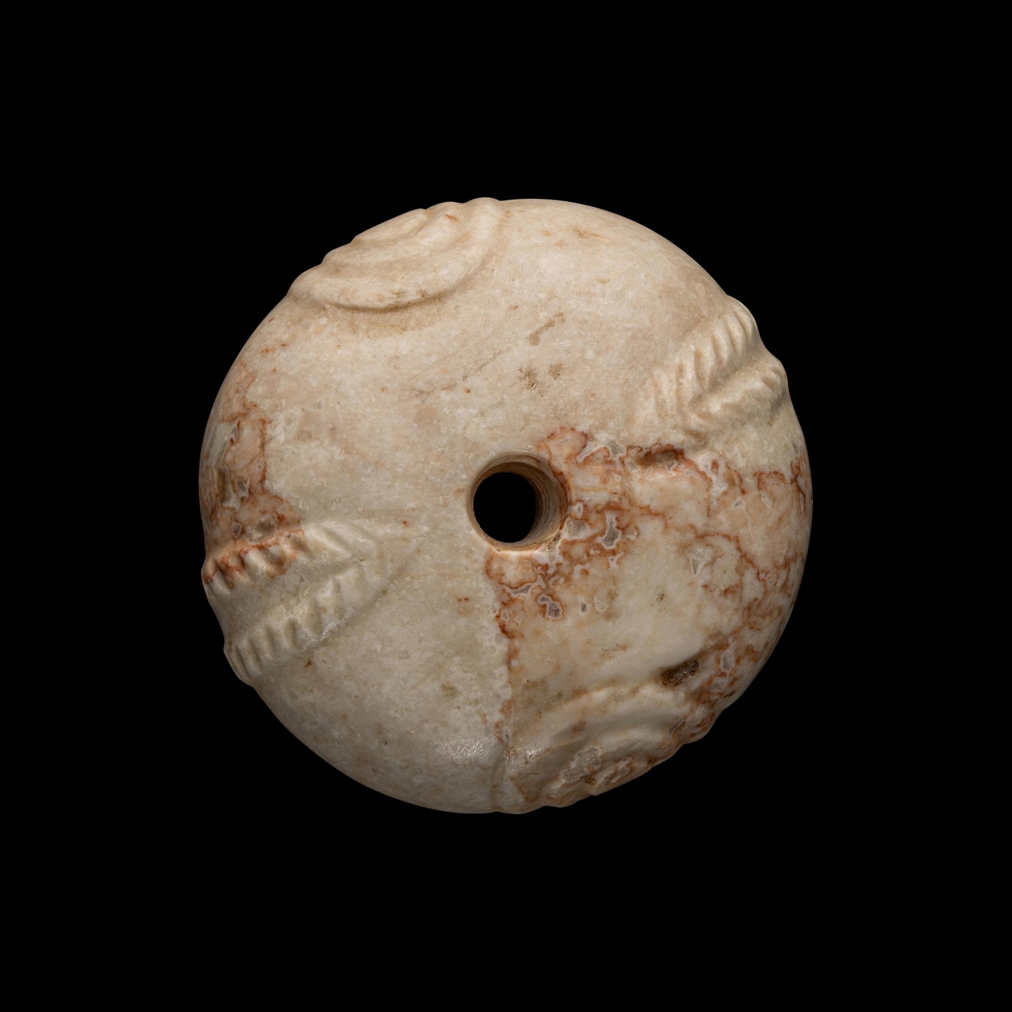 A Near Eastern Marble Mace Head