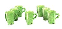 A Set of Seven Dodie Thayer Lettuce Ware Mugs Height 5 1/4 inches.