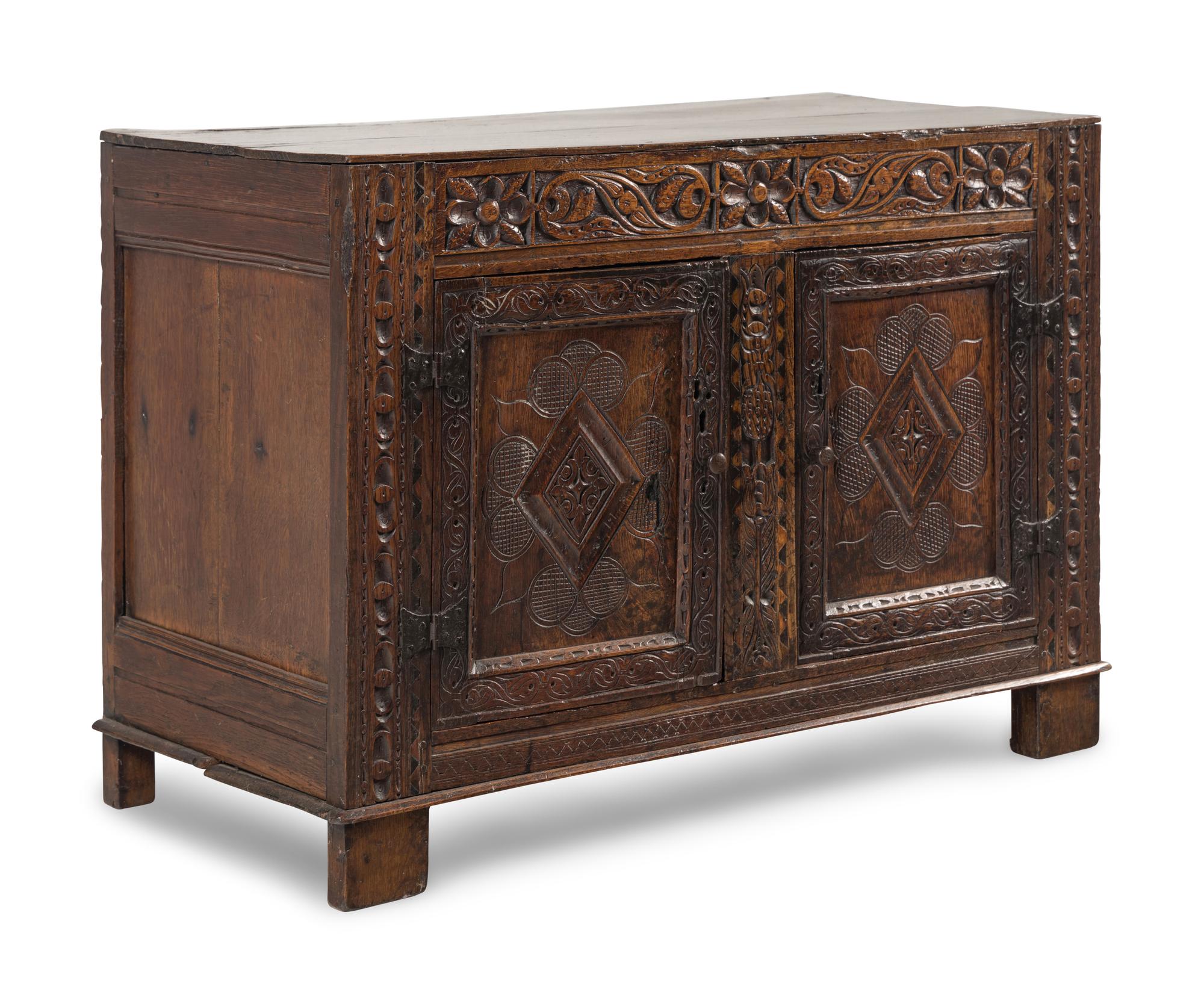A Welsh Carved Oak Side Cabinet