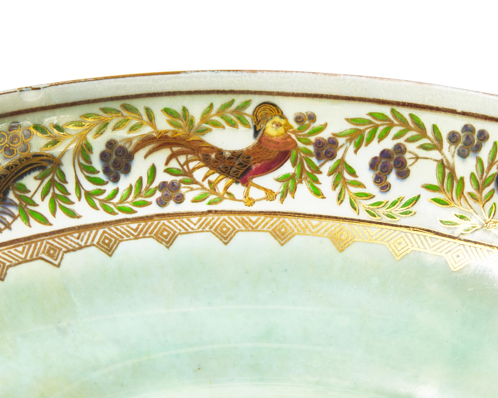 A Wedgwood Fairyland Lustre "Amherst Pheasant" and Pheasant's Eye" Pattern Fruit Bowl