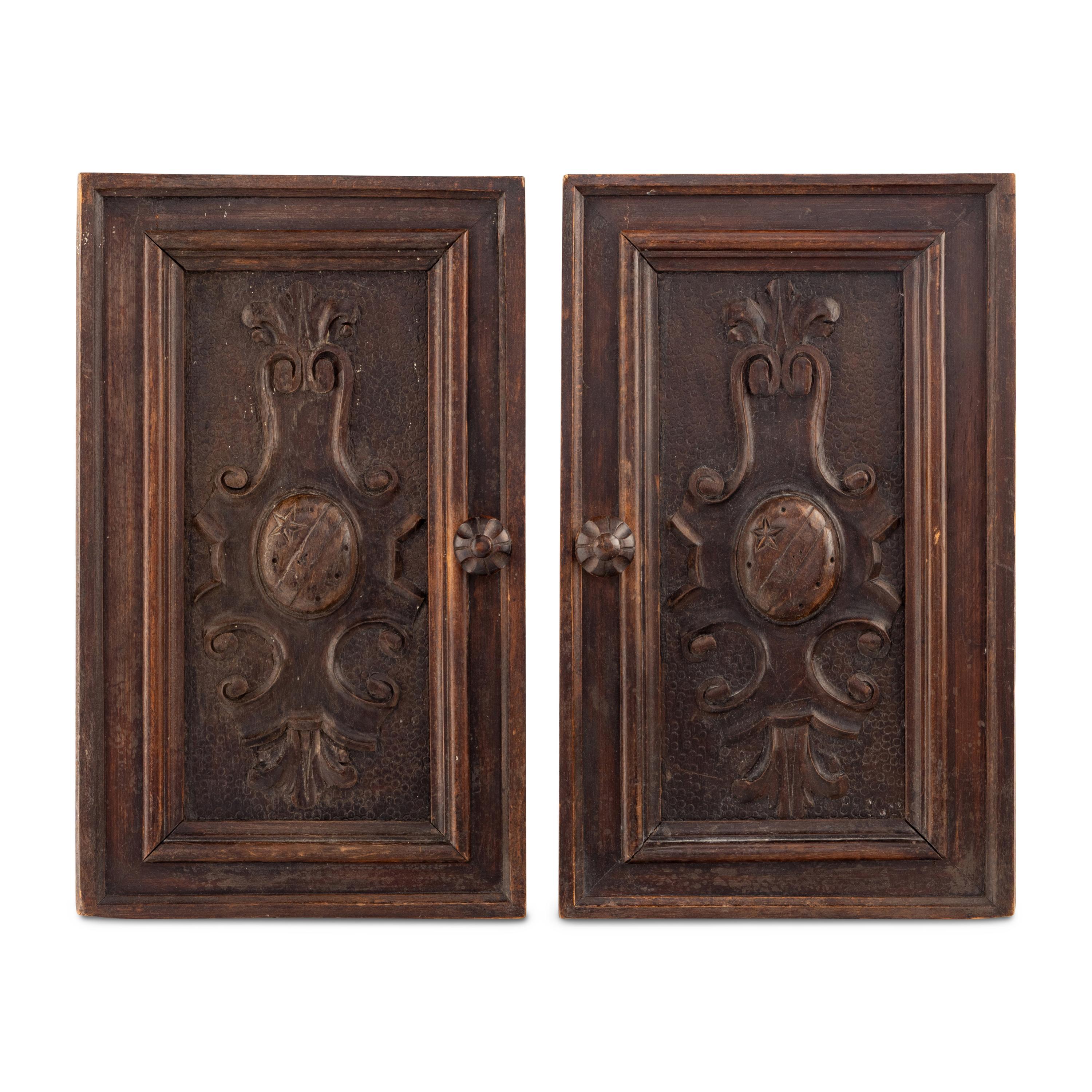 A Pair of Italian Walnut Cabinet Door Panels