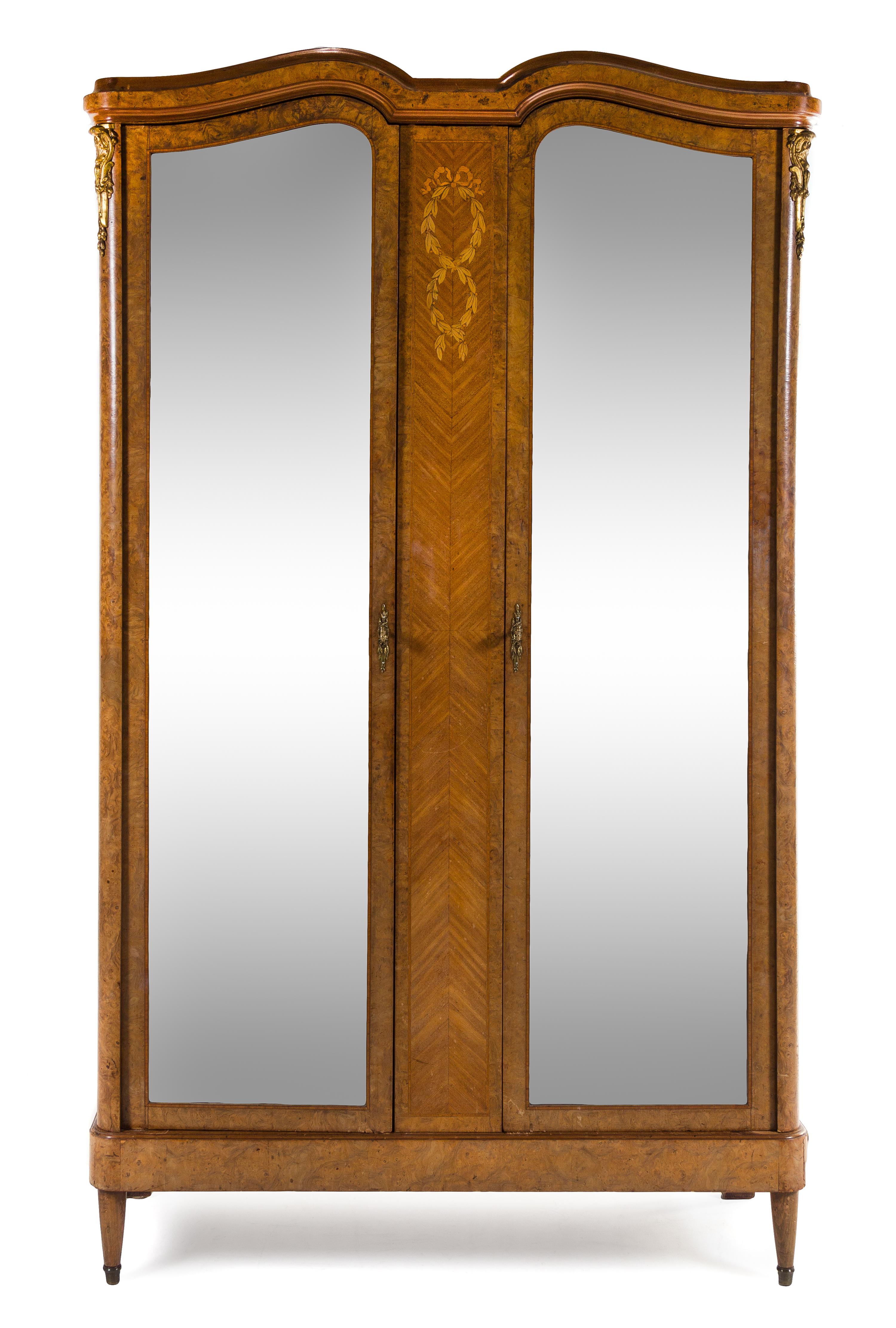 A Louis XVI Style Burlwood and Marquetry Armoire Height 90 3/4 x width 52 1/2 x depth 20 1/4 inches. — CIRCA 1900