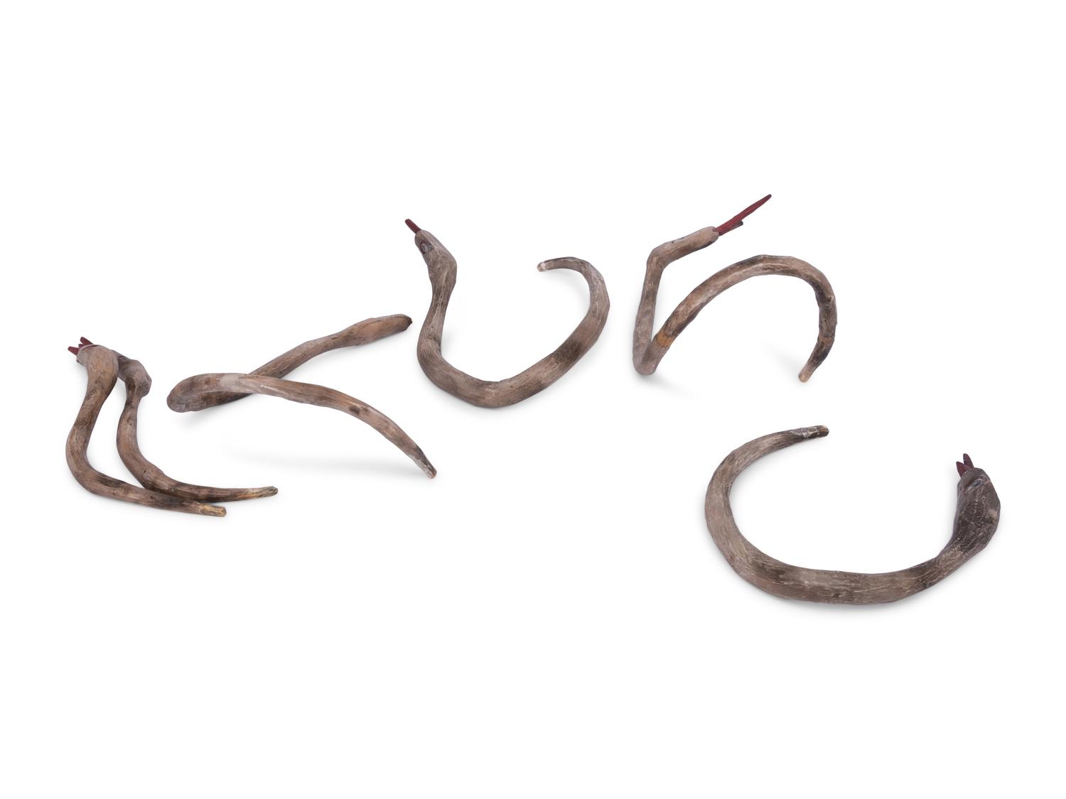 A Collection of Six Wooden Snakes