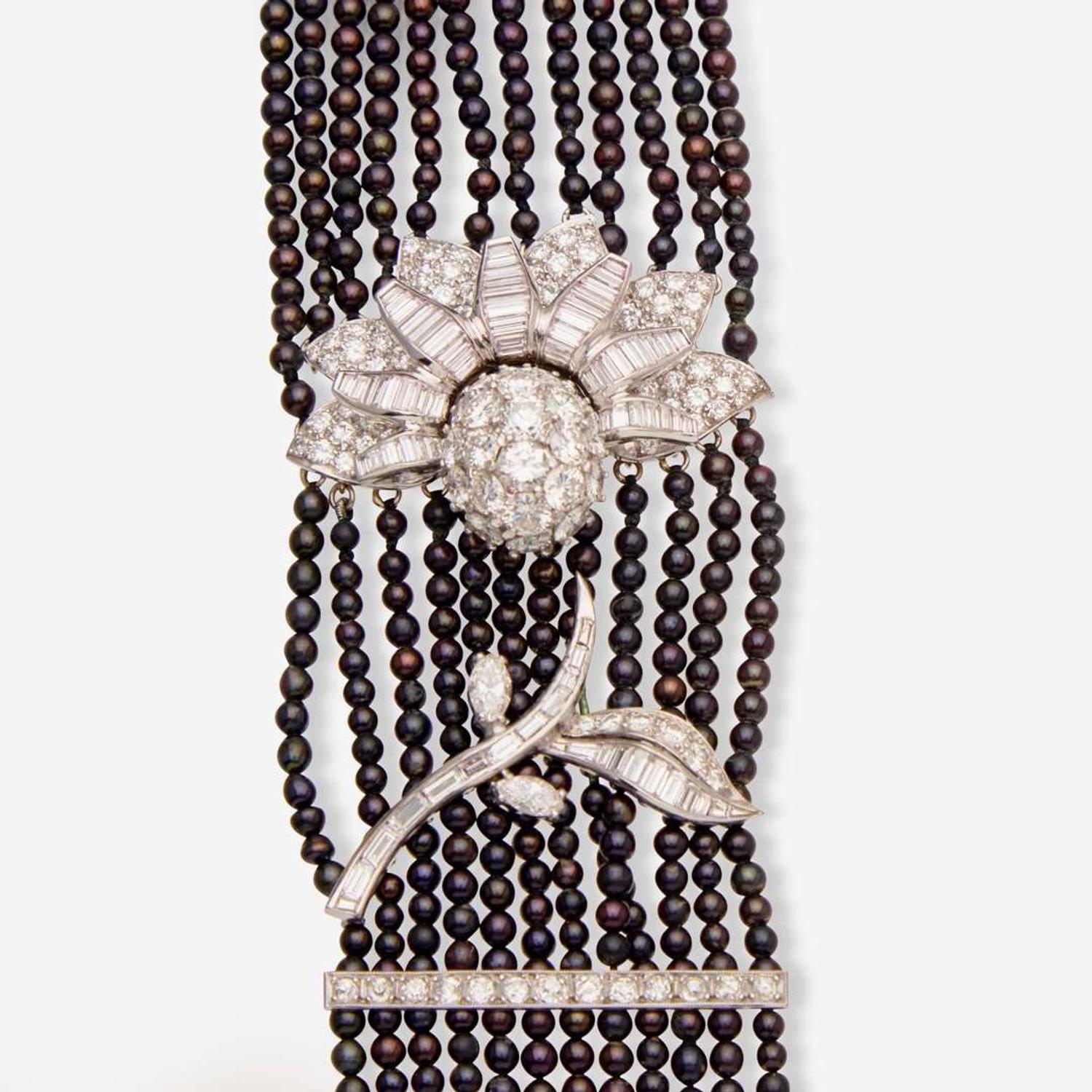 A Multi-Strand Black Pearl and Diamond Necklace