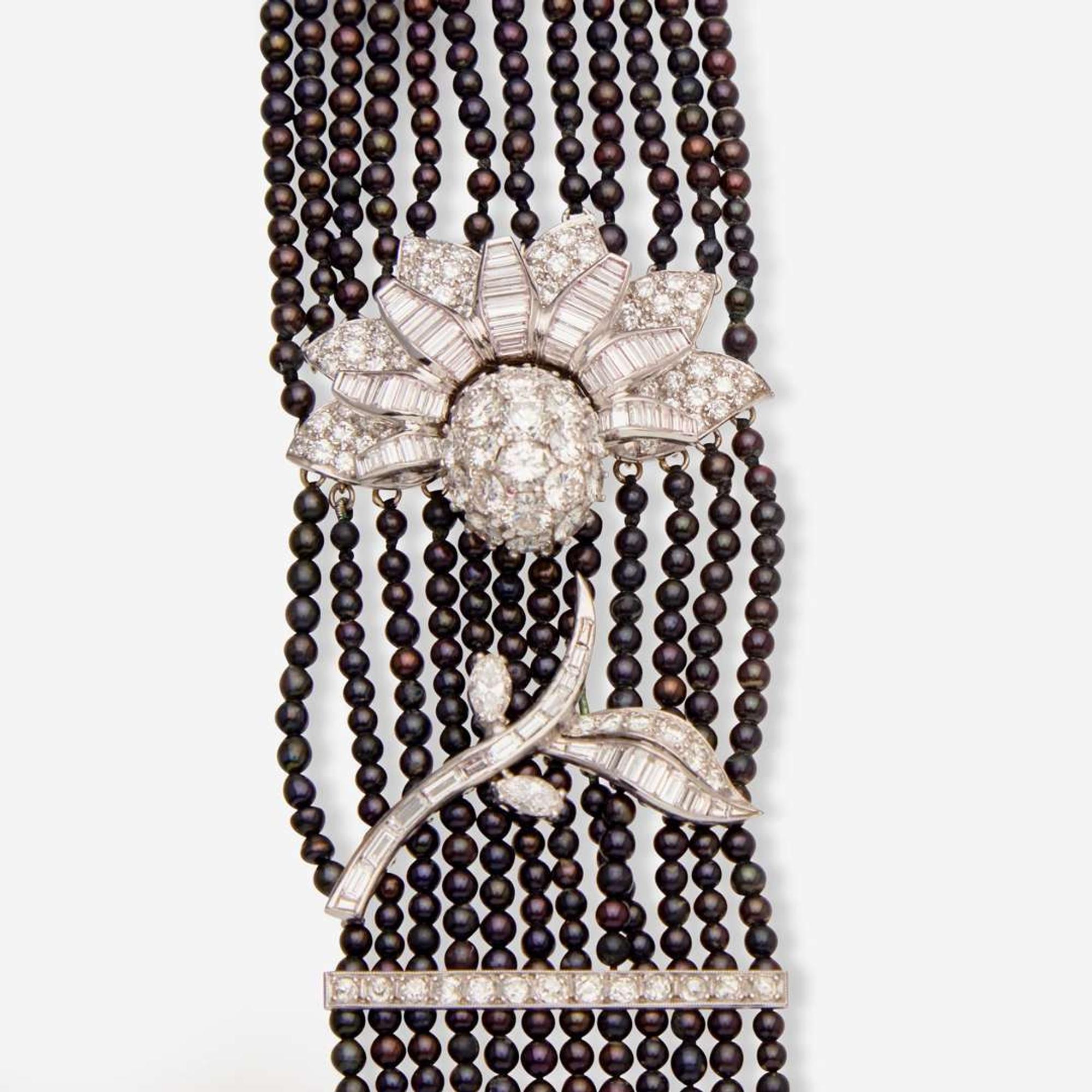 A Multi-Strand Black Pearl and Diamond Necklace