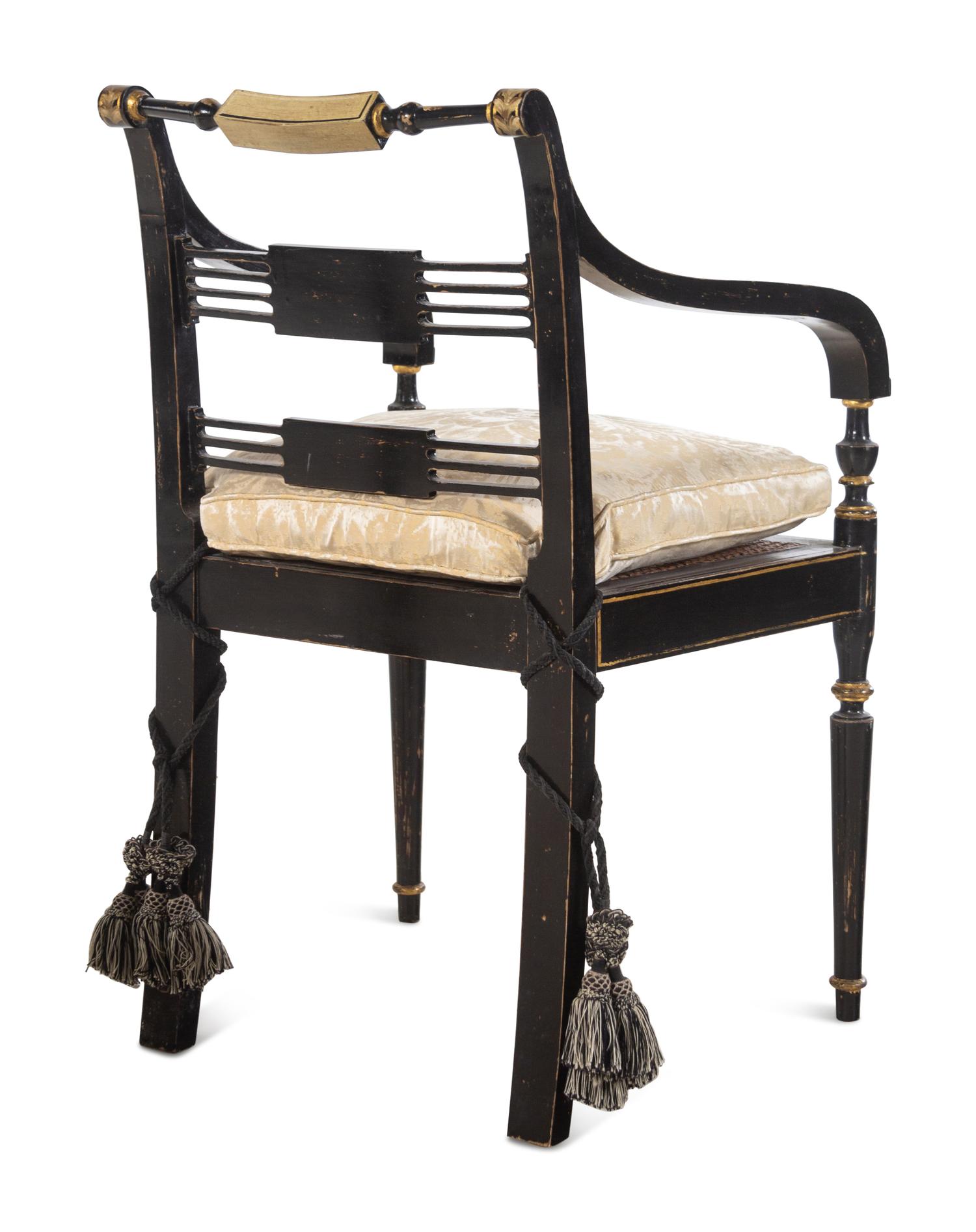 A Pair of Regency Painted and Ebonized Armchairs