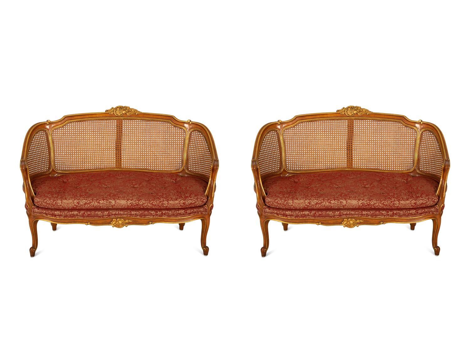A Pair of Louis XV Style Stained and Giltwood Settees