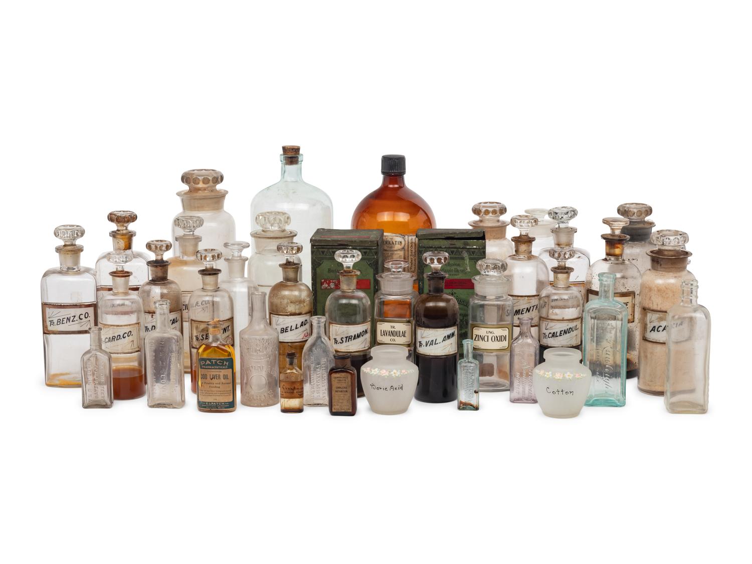 A Collection of Glass Apothecary Bottles