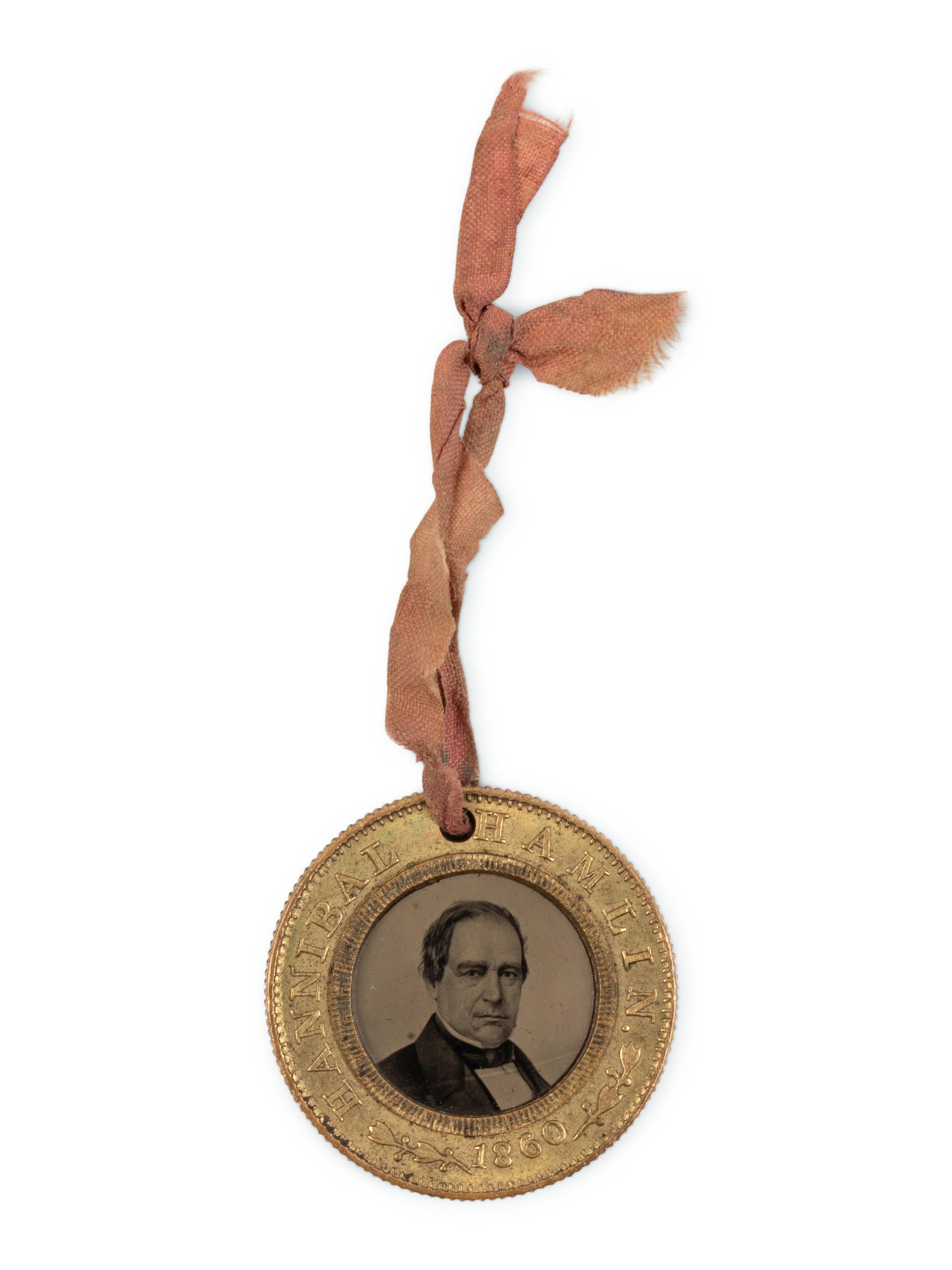 [LINCOLN-HAMLIN CAMPAIGN]. A presidential campaign token featuring ferrotype portraits of Lincoln and Hamlin, ca. 1860.