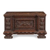 An Italian Carved Walnut Coffer
