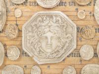 A Framed Collection of Grand Tour Style Plaster Intaglios