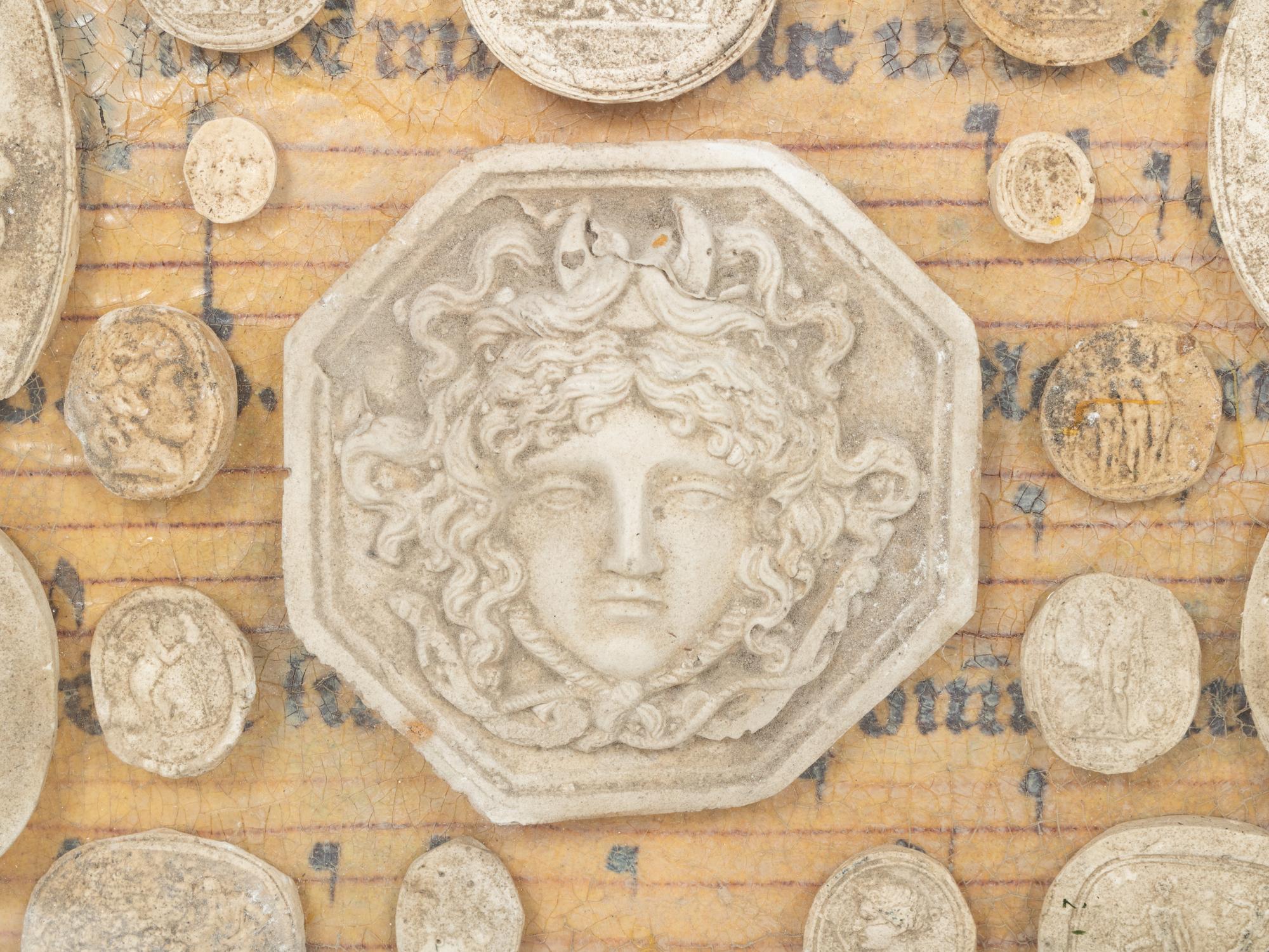 A Framed Collection of Grand Tour Style Plaster Intaglios