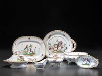 An English Parcel Gilt Bird and Insect Decorated Porcelain Partial Dinner Service