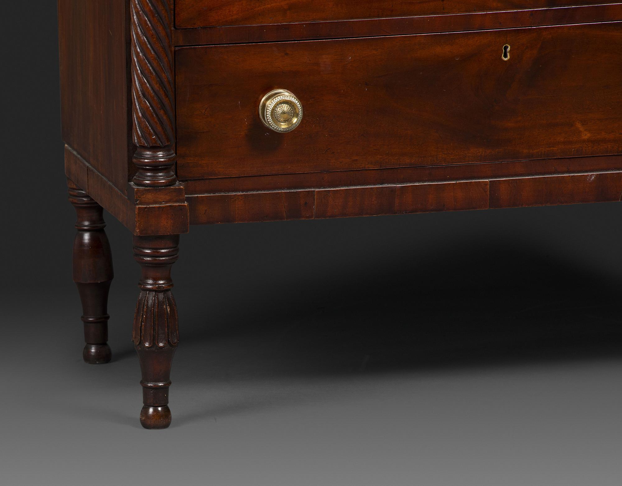 A Federal Carved and Figured Mahogany Lady's Writing Desk