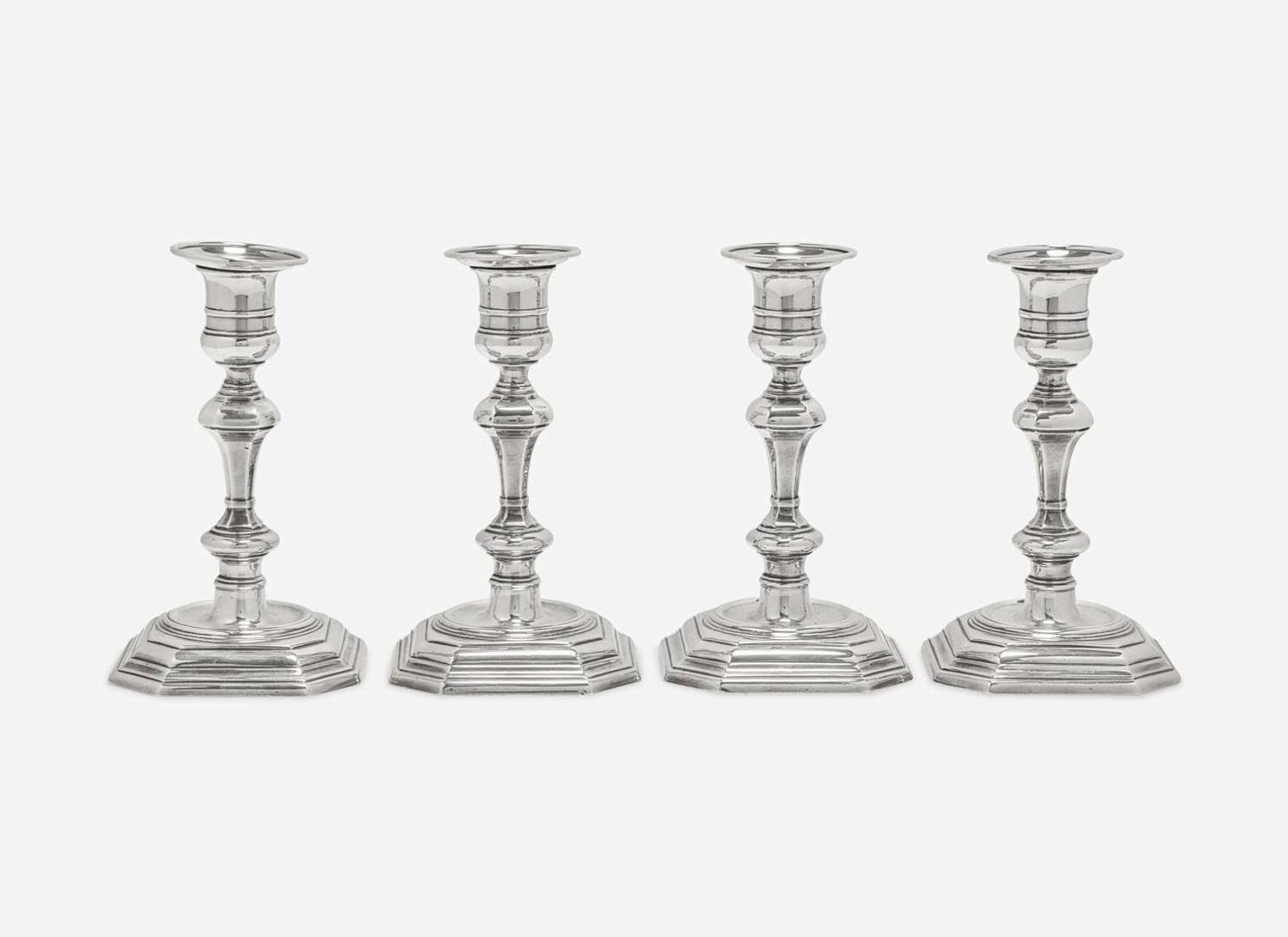 A set of four Elizabeth II weighted sterling silver candlesticks, Atkin Brothers, Sheffield, 1955