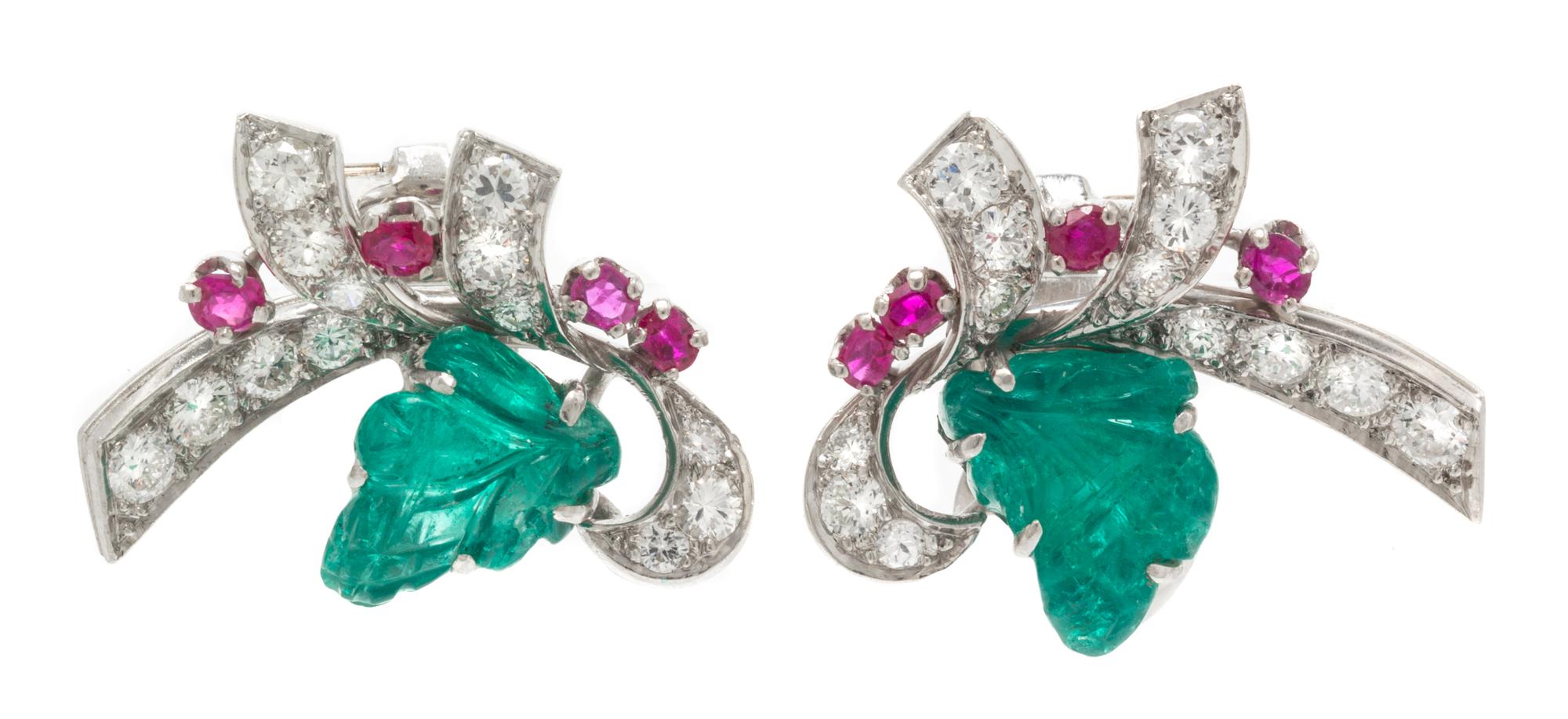 A Pair of Platinum, Emerald, Ruby and Diamond Earclips, 6.50 dwts.