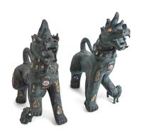 A Pair of Chinese Stone-Inset Bronze Fu-Lions — 20TH CENTURY
