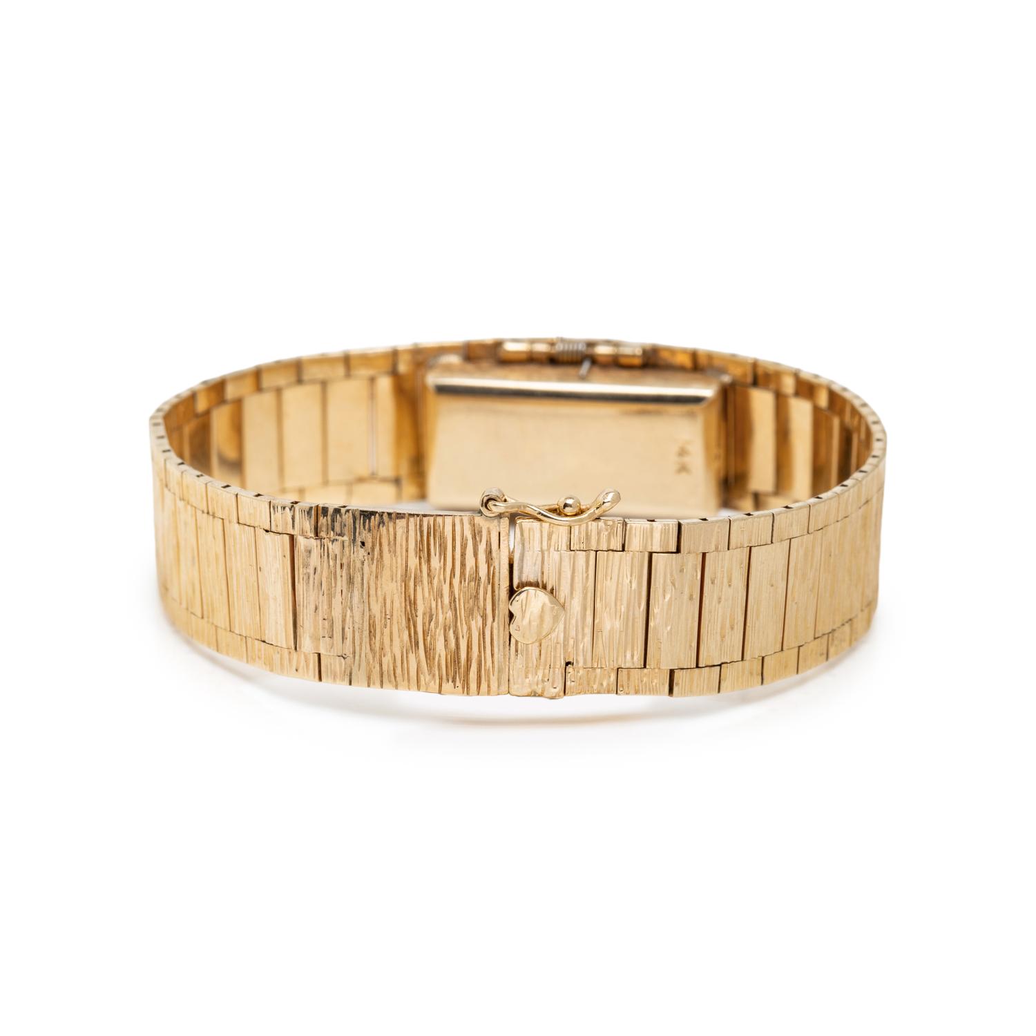 GENEVE, 14K YELLOW GOLD AND DIAMOND SURPRISE WATCH