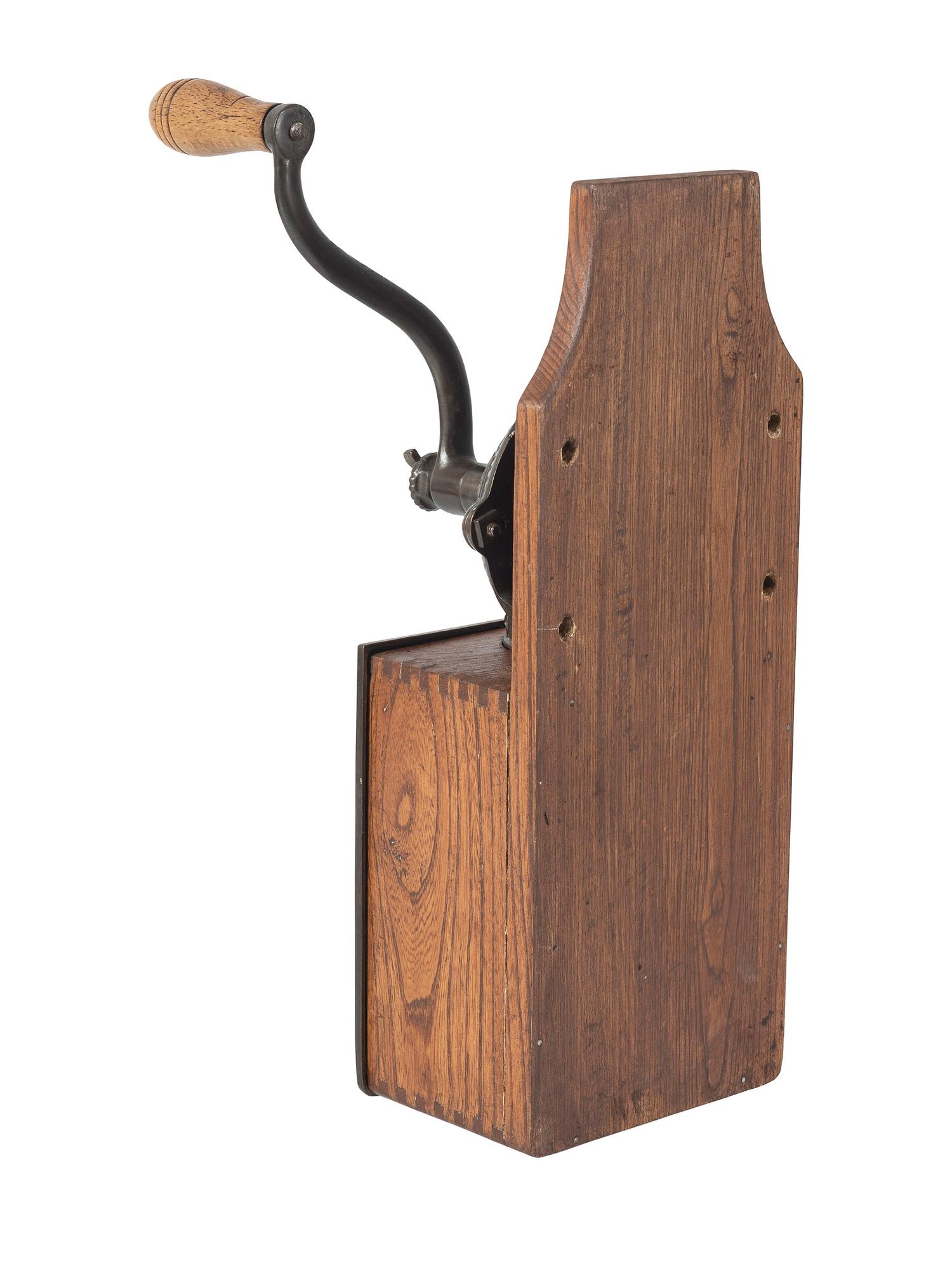 A Bell Cast Iron Wall Mount Coffee Grinder