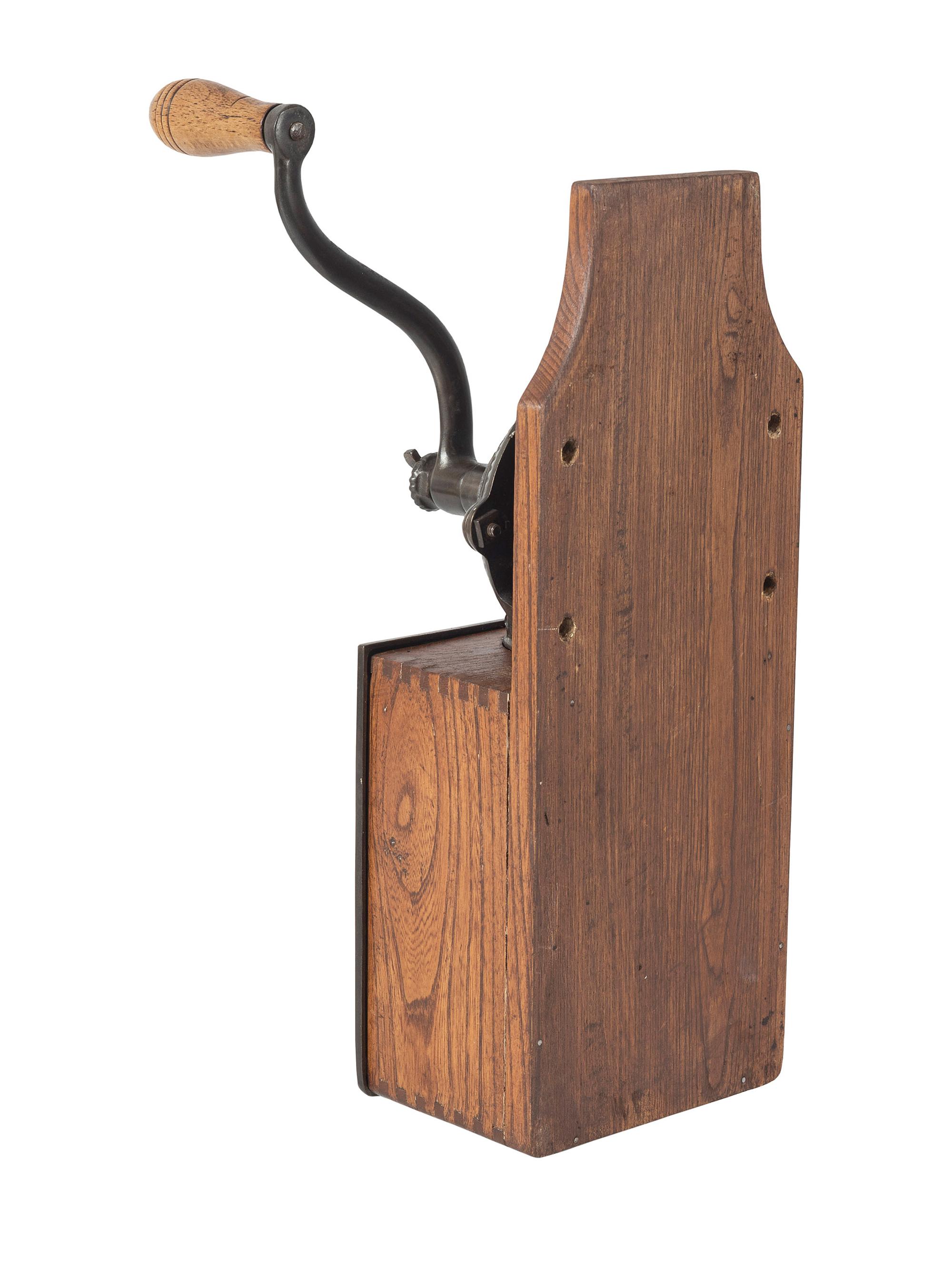 A Bell Cast Iron Wall Mount Coffee Grinder