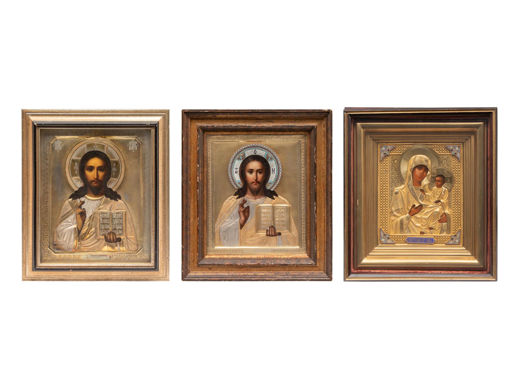 A Group of Three Russian Enameled Oklad Icons