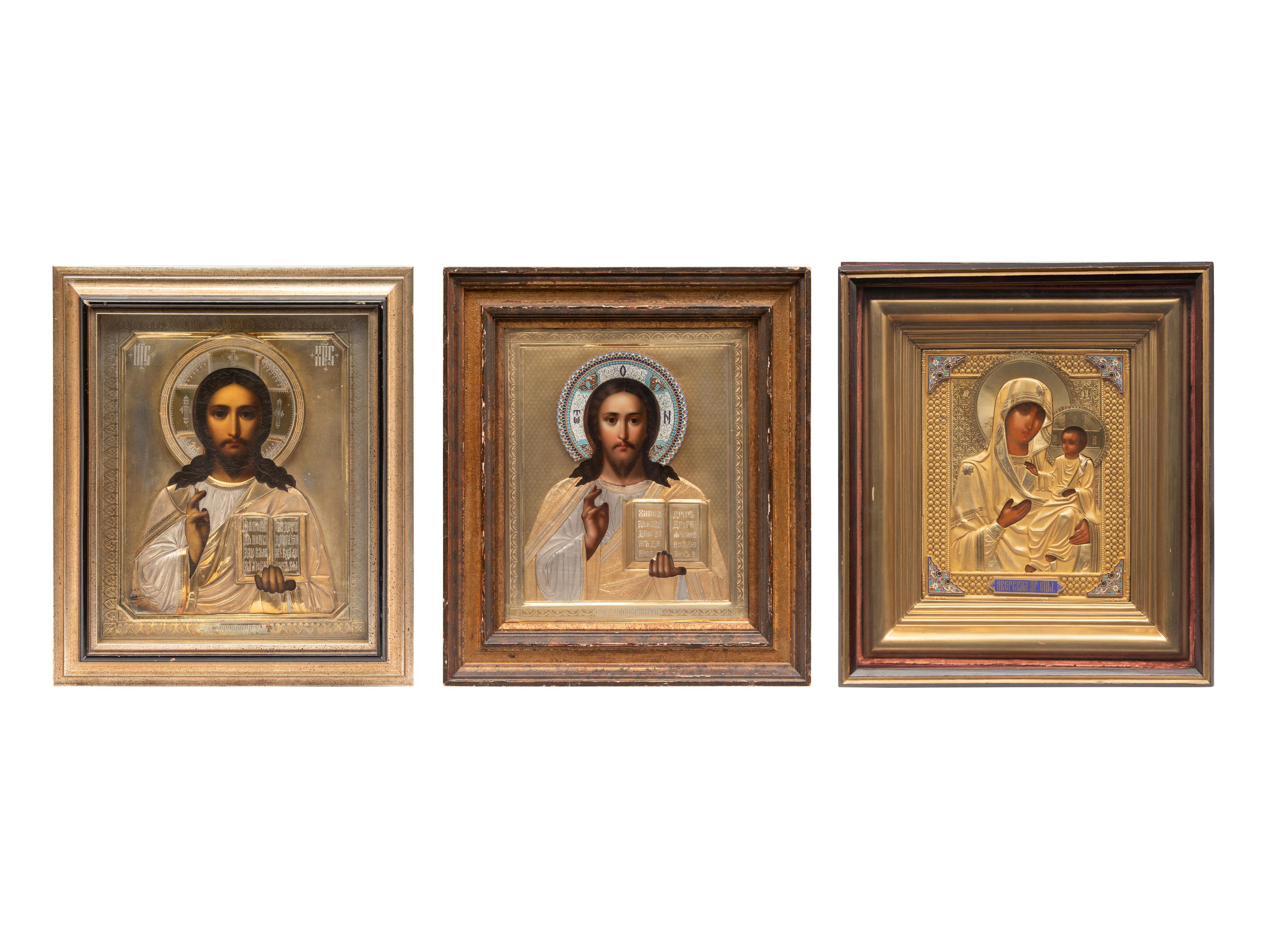 A Group of Three Russian Enameled Oklad Icons