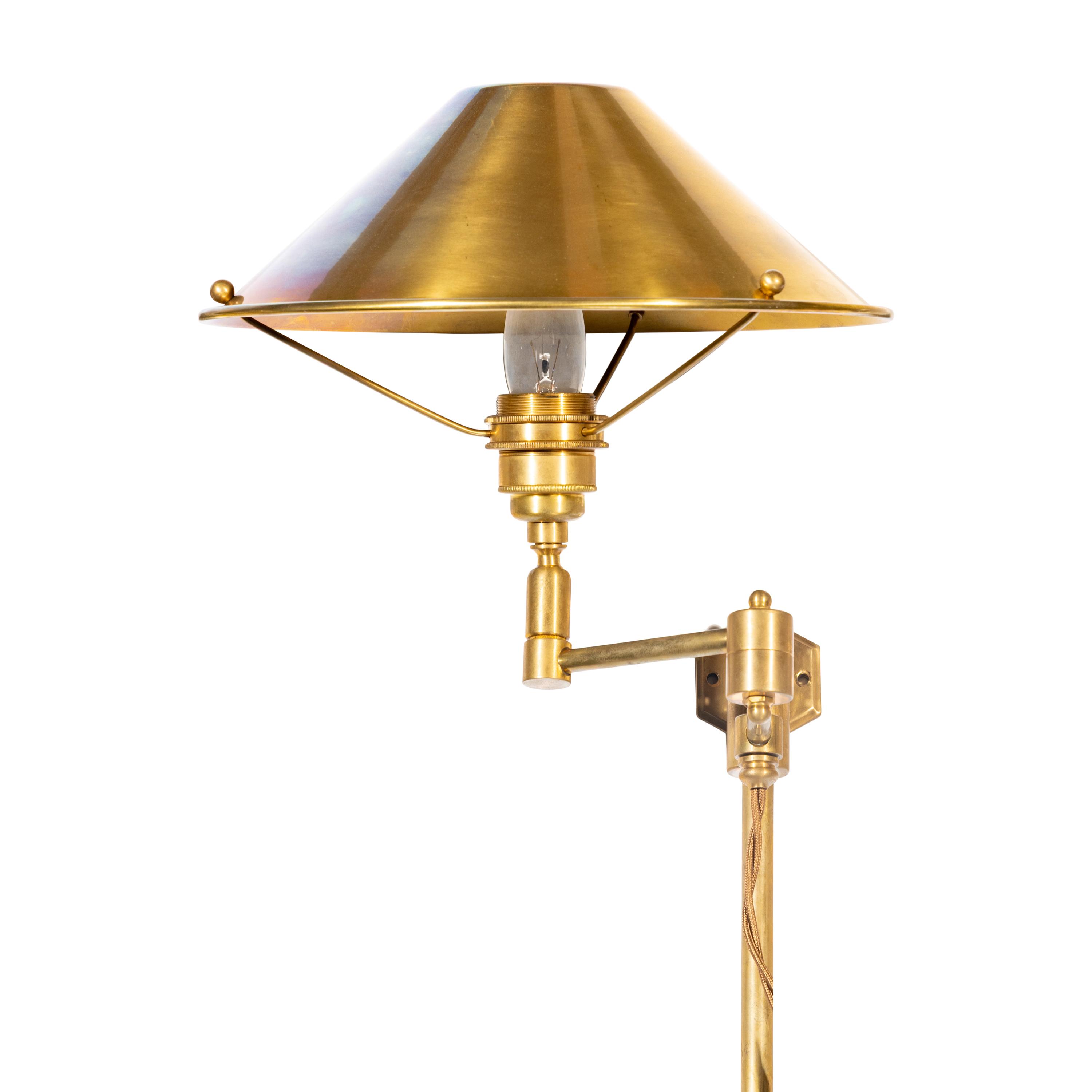 Two Pairs of Besselink and Jones Brass Swivel-Arm Library Lights