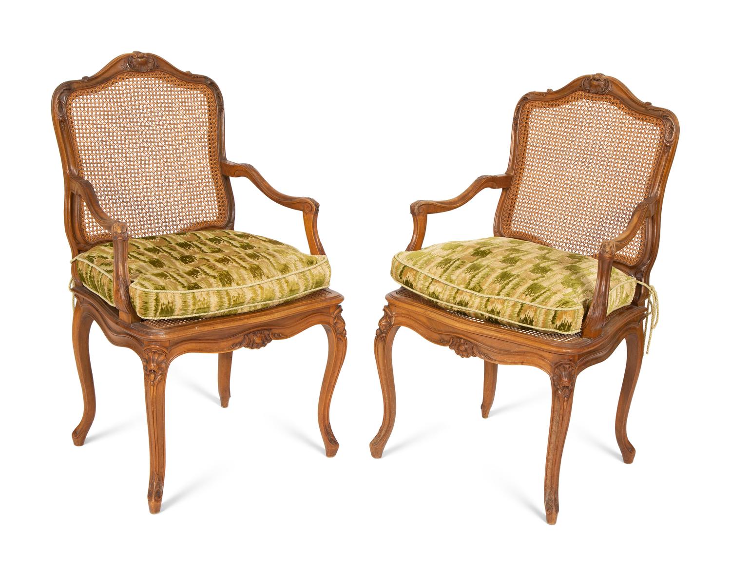 A Pair of Louis XV Style Caned Beechwood Fauteuils