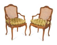 A Pair of Louis XV Style Caned Beechwood Fauteuils