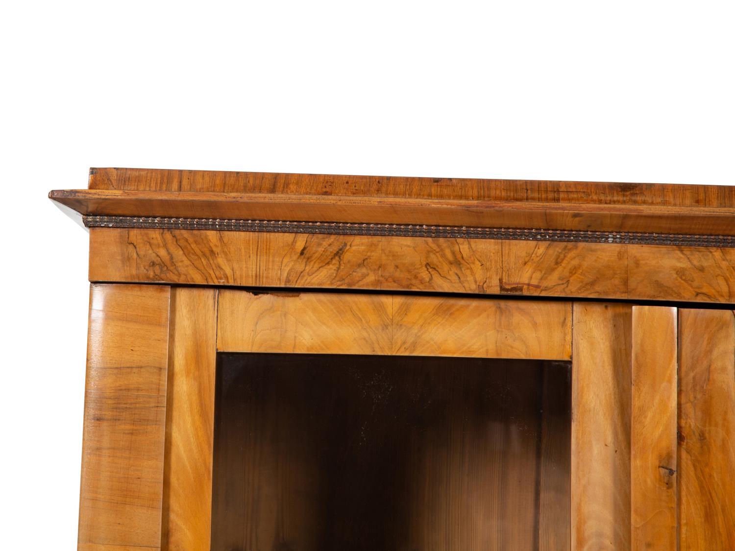 A Pair of Biedermeier Figured Birch Bookcases